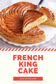 a french king cake on a plate with a knife