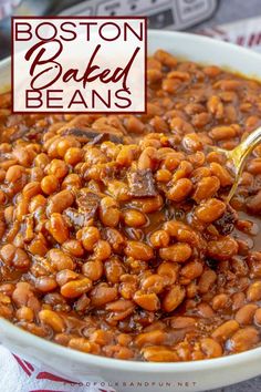 a bowl filled with baked beans on top of a table