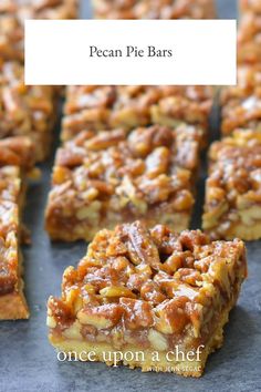 pecan pie bars are stacked on top of each other and ready to be eaten