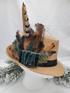 "\"The Hunt \" Fedora features a mix of Peacock,  Pheasant,  & Rooster feathers with hand torn green silk velvet trim & rhinestone accents.  Size unisex:  S/M *Christmas pin is removable" Peacock Pheasant, Rooster Feathers, Christmas Pins, Velvet Trim, Handmade Hat, Pheasant, Green Silk, Silk Velvet, Fedora