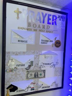 a bulletin board that has been decorated with paper and magnets for the word prayer