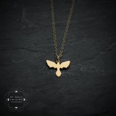 Tiny Phoenix necklace, small gold Phoenix bird #jewelry #necklace @EtsyMktgTool #phoenixnecklace #tinynecklace #tinycharm #phoenixpendant Gold Pendant Necklace With Bird Design, Gold Necklace With Bird Design As Gift, Gold Necklace With Bird Design For Gift, Traditional Rings, Phoenix Necklace, Tiny Necklace, Phoenix Pendant, Trend Jewelry, Phoenix Bird