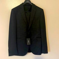 Brand New With Tags. Hugo Boss Suit. Stretch Tailoring Designer Fitted Black Sets, Designer Black Sets For Workwear, Black Tailored Designer Sets, Designer Black Evening Sets, Designer Black Sets For Evening, Hugo Boss Suit, Boss Suits, Hugo Boss, Mens Suits