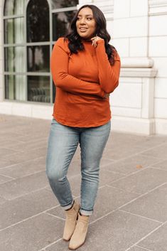 Spice up your style with this rust colored turtleneck top with ruched detailing along the neckline! A touch of stretch that hugs your body in all the right places. Fitted long sleeves and form fitting body throughout, it's the ultimate layering shirt to add a pop of color to your closet!Lightweight + Mock turtleneck 95% Acrylic, 5% SpandexWash Cold, Hang Dry Fit true to size *Measurements listed below are of the actual clothing item* XS: Chest 32" Length 25"S: Chest 34" Length 25.5 "M: Chest 36" Girls Turtleneck, Layered Shirts, Turtleneck Top, Mock Turtleneck, Turtle Neck Top, Rust Color, Hanging Pendants, Colored Denim, Boyfriend Fit