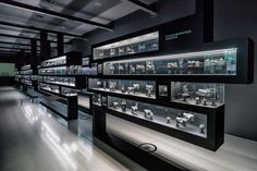 a room filled with lots of glass cases