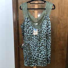 A Fun Twist On Classic Leopard Print! Pretty Eyelash Lace Detail Neckline That V’s In The Front And Back. Spring Leopard Print Camisole Top, Leopard Print Camisole Top For Spring, Umgee Tops, Lace Detail, Leopard Print, Twist, Womens Tops, V Neck, Tank Tops