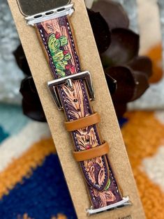 Add a touch of Western charm to your Apple Watch with our Desert Mirage Watch Bands. These stylish bands feature two designs and sizes, each with a tooled brown leather band adorned with cow skulls and cactus motifs in silver. Upgrade your watch and show off your unique personality with these one-of-a-kind bands! 38/41mm or 42/45mm Cactus Motif, Desert Mirage, Cow Skulls, Jewelry Watch, Cow Skull, Western Leather, Leather Watch Bands, Watch Accessories, Leather Band