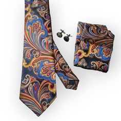 Want a special tie for nice clothes or weddings? Our Gold Navy Blue Silk Tie Pocket Square Set is perfect. It's made of good silk and makes your outfit look fancy. The colors are nice, and the tie and pocket square are made well. Good for parties or weddings. The set has a tie and a pocket square. The tie is 59 inches long and 3.34 inches wide. You can use a warm iron if you need to. Formal Blue Silk Neckwear, Blue Silk Neckwear For Formal Occasions, Elegant Blue Pocket Square For Semi-formal Occasions, Elegant Blue Semi-formal Pocket Square, Elegant Multicolor Ties For Father's Day, Elegant Ties With Pocket Square For Father's Day, Elegant Multicolor Ties As A Gift, Elegant Multicolor Formal Pocket Square, Elegant Multicolor Pocket Square For Formal Occasions