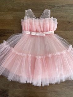 Beautiful Tulle Dress with or without pearls made for your baby girl or toddler. This dress will be a show stopper! Tulle Dress Newborn, Spring Sleeveless Pageant Dress For Dress-up, Tulle Dress With Ruffles For Dress-up, Elegant Summer Dress For Pageants, Spring Sleeveless Princess Pageant Dress, Sleeveless Summer Tutu Dress For Pageants, Summer Pageant Princess Dress With Tulle Skirt, Sleeveless Summer Pageant Dress, Fitted Summer Pageant Dress With Ruffles