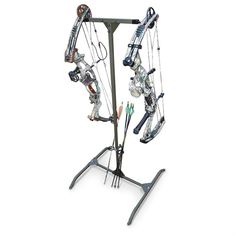 two robots are attached to a metal pole with arrows in the shape of bowhuns