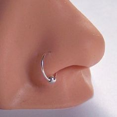 a close up of a fake nose ring