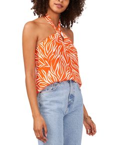 Sunset-inspired animal stripes embolden this blousy top styled with a twisted halter neckline| Halter neck Sleeveless| with cutaway shoulders 100% polyester Machine wash| tumble dry Imported Halter Neck Blouses, Striped Halter Top, Halter Blouse, Sunset Orange, Navy Lace, Round Neck Tops, V Neck Blouse, Halter Neckline, Split Hem