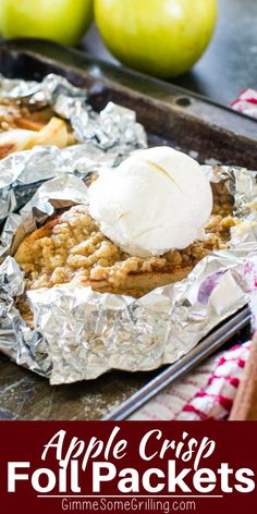 an apple crispy foil packet with ice cream on top and apples in the background