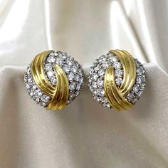 A stunning pair of vintage clip-on earrings featuring a cluster of round brilliant cut diamonds and an abstract gold design. The earrings follow a round shape and were made in 18k yellow gold circa 1970. The total approximate diamond weight of these earrings is 8.50 carats, H-I color, VS2-SI1 clarity. The measurements of these earrings are 25mm. The backs are 14k yellow gold clip-on and have posts. The posts can be removed. If you have any questions about the Rustburg earrings, please feel free Yellow Diamond Earring, Vintage Diamond Earrings, Fancy Diamond Ring, Estate Diamond Jewelry, Designer Diamond Jewellery, Colored Diamond Rings, Jewelry Education, Diamond Earring, Fancy Diamonds