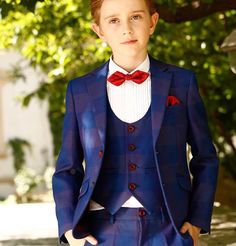 Nothing speaks classy other than the Navy Blue & Burgundy Classic Fit Suit. This elegant suit is the perfect suit for a young gentleman giving him the perfect tailored look for his next special event. COMES IN A 5-PIECE SET which includes a trouser, jacket, vest, shirt, and bow tie. You can have your kids wear them as a set or pair them with other clothes! WITH AN ELASTIC WAISTBAND this will give your kids enough space to move as the waist area is stretchable. CLASSICAL AND COMFORTABLE LOOK that Classic Royal Blue Tuxedo With Notch Lapel, Dapper Three-piece Single Breasted Suit For Formal Occasions, Dapper Single Breasted Three-piece Suit For Formal Occasions, Classic Three-piece Suit With Notch Lapel In Royal Blue, Dapper Single-breasted Three-piece Suit For Formal Occasions, Classic Three-piece Suit In Royal Blue With Notch Lapel, Classic Royal Blue Three-piece Suit For Semi-formal Occasions, Classic Royal Blue Three-piece Suit For Semi-formal Events, Semi-formal Royal Blue Three-piece Suit With Notch Lapel