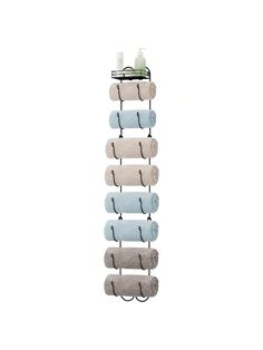 several rolls of toilet paper hanging from hooks