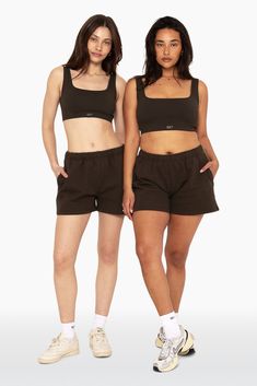 Step into casual elegance with our Sweat Shorts in Espresso. Featuring a leg-lengthening fit, clean sewn bottom hem, and high rise, these shorts offer both comfort and style. Embroidered with the SET logo on the upper right thigh, they add a touch of sophistication to your loungewear collection. Fitted Sportswear Shorts For Loungewear, Fitted Shorts With Pockets For Loungewear, Basic Relaxed Fit Short Length Activewear, Fitted Loungewear Shorts With Pockets, Casual Stretch Tops Mid-thigh Length, Casual Mid-thigh Length Tops, Fitted Lounge Shorts With Pockets, Comfortable Fitted Shorts For Loungewear, Basic Fitted Shorts For Loungewear