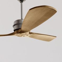 a ceiling fan with a light on it's side and two blades in the middle