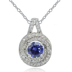 Wear the look of luxury and enjoy the vintage of elegance with this breathtaking 100 facets cubic zirconia necklace. The 100 facets transform the ordinary cubic zirconia stone into a brilliant jewel. This love knot necklace showcases a round blue violet CZ stone surrounded by smaller cubic zirconia stones and is crafted of platinum plated sterling silver. The total carat weight is 1.15ct. Product Details Metal Type sterling-silver Metal Stamp 925-sterling Weight 3.2GR Length 18IN Width 18.7MM He Dazzling Necklace With Center Stone As Gift, Sapphire Color Cubic Zirconia Fine Necklace, Dazzling Necklace With Center Stone For Gift, Sapphire Color Cubic Zirconia Fine Jewelry Necklace, Sapphire Cubic Zirconia Fine Jewelry Necklace, Round Diamond Cut Necklace With Lab-created Sapphire, Round Diamond Cut Lab-created Sapphire Necklace, Diamond Cut Lab-created Sapphire Necklace As Gift, Diamond Cut Lab-created Sapphire Necklace