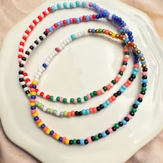 Everyday Heishi Beaded Necklaces, Everyday Multicolor Beaded Chain Bracelets, Minimalist Beaded Chain Bracelets, Friendship Bracelets With Spacer And Round Beads, Everyday Tiny Beads Bracelets, Minimalist Beaded Necklace With Round Letter Beads, Everyday Tiny Bead Bracelets, Minimalist Beaded Necklace With Letter Beads, Everyday Tiny Round Beads Bracelet