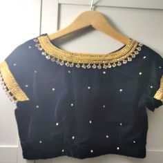 Readymade Blouse For Saree. Navy Blue Colour With Beautiful Crystal Hanging Work On It. Size -36 ,Can Be Extended Upto 40 Bundle Up For More Discounts Don't Forget To Check My Other Closet Items . Happy Shopping Blue Mirror Work Top For Festive Season, Fitted Blue Tops With Mirror Work, Bollywood Style Blue Party Top, Fitted Long Sleeve Tops With Dori Work, Traditional Blue Tops With Mirror Work, Short Sleeve Tops With Zari Work For Festivals, Bollywood Festive Tops With Short Sleeves, Festive Bollywood Tops With Short Sleeves, Festive Bollywood Short Sleeve Tops