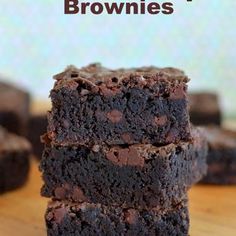 chocolate brownies stacked on top of each other