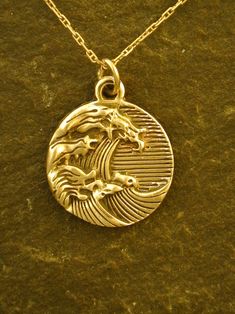 14K Gold Wave Pendant on a 14K Gold Chain - Etsy Unique Polished Yellow Gold Necklaces, Unique Yellow Gold Necklaces With Polished Finish, Gold Medallion Jewelry Hand Cast, Gold Medallion Hand Cast Jewelry, Engraved Bronze 14k Gold Necklaces, Bronze 14k Gold Jewelry For Gift, Hand Cast 14k Gold Jewelry, Symbolic Yellow Gold Hand Cast Jewelry, Symbolic Hand Cast Yellow Gold Jewelry