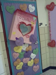 a door decorated with hearts and congratulations messages