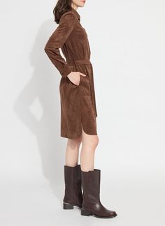 This Vegan Suede pull-over shirt-dress – like our classic, best-selling Schiffer Button Down – is a timeless piece appropriate for work, travel and gatherings with friends. Offering a straighter and slimmer silhouette when compared to our Schiffer Button Down, the Vegan Suede Schiffer Dress features a detachable belt, front pocket and a sewn front placket so it never gaps. Made from 4-way stretch Vegan Suede, the Schiffer Dress offers ¾ sleeves, a double-yoke back with deep pleat, and functional Casual Button-up Business Dress, Fall Knee-length Shirt Dress With Placket, Classic Shirt Dress For Fall Workwear, Classic Shirt Dress For Workwear In Fall, Classic Knee-length Shirt Dress With Placket, Chic Fall Business Shirt Dress, Classic Solid Shirt Dress For Office, Classic Solid Color Shirt Dress For Office, Classic Long Sleeve Shirt Dress For Work