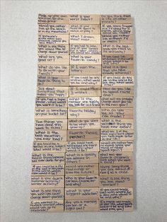 several pieces of cardboard are stacked on top of each other with words written on them