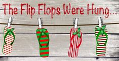 the flip flops were hung on a line with christmas stockings hanging from it's clothesline