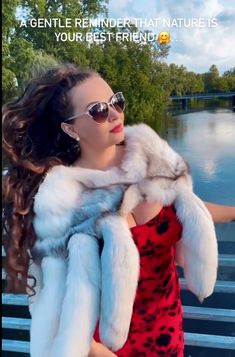 a woman wearing sunglasses and a white fur coat with the caption, a gentle reminder that nature is your best friend