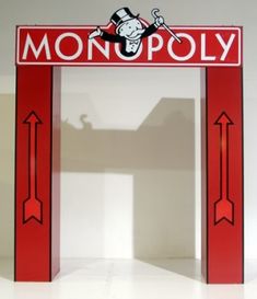 a red and white sign that says monopoly on it