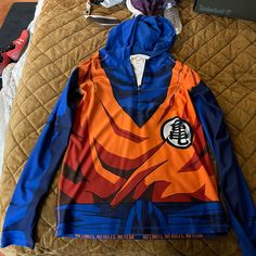 Goku - Mens Long Sleeve Skinz Hoodie From Justsaiyan.Co In Brand New Condition!!!! Is A Size 3xl But Fits Smaller As It Was Made In Another Country. I Usually Wear Xl Casual Blue Hoodie For Cosplay, Blue Casual Hoodie For Cosplay, Blue Long Sleeve Hoodie For Cosplay, Sports Fan Graphic Print Long Sleeve Hoodie, Orange Long Sleeve Sports Hoodie, Grey Trench Coat, Adidas Track Suit, Champion Reverse Weave, Champion Sweatshirt