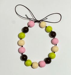 Handmade Modern Beaded Necklace for Fall Brown Necklaces With Colorful Round Beads, Unique Brown Necklaces With Colorful Beads, Brown Long Necklace With Colorful Round Beads, Elegant Multicolor Wooden Beads Necklaces, Unique Brown Necklace With Large Beads, Playful Multicolor Necklace, Tie Necklace, To Autumn, Pistachio Green