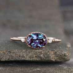 2Ct Oval Cut Alexandrite Women's Solitaire Engagement Ring 14K Rose Gold Finish  THIS Ring IS READY TO MADE A ORDER    ✔ Metal Purity : 925 Sterling Silver ✔ Main Stone Shape : Oval ✔ Main Stone : Alexandrite ✔ Main Stone Color : Purple ✔ Main Stone Creation : Simulated ✔ Main Stone CT Weight : 2Ct ✔ Ready to Ship in 3-5 Business Days ♥ Custom Birthstone Ring ♥  The most unique jewelry you can find, perfect gift for you and your loved one  ♥ BIRTHSTONE COLOR ♥ * Design can be personalized with your BIRTHSTONE COLORS: January - Garnet February - Amethyst March - Aquamarine April - Clear Crystal May - Emerald June - Light Amethyst July - Pink Ruby August - Dark Peridot September - Sapphire October - Light Tourmaline November - Yellow Topaz December - Blue Zircon O T H E R ∙ I N F O R M A T I Oval Gemstone Ring In 14k Rose Gold, Oval 14k Rose Gold Ring With Gemstone, Oval 14k Rose Gold Gemstone Rings, 14k Rose Gold Oval Rings, Oval 14k Rose Gold Rings, Accent Engagement Ring, Custom Birthstone Ring, Ring Style, Plated Jewelry