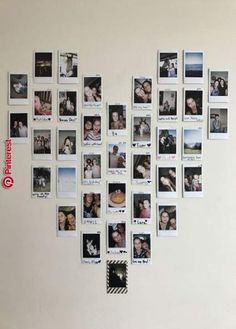 a white wall with many pictures hanging on it's side and one has a heart shaped frame in the middle