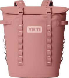 a pink yeti cooler bag sitting on top of a white background