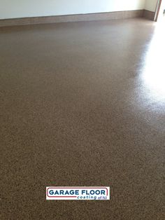 a garage floor with a sticker that says garage floor