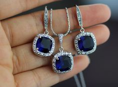 I made this set using sapphire Cushion Cut stone and they are finished with white gold plated earire , and white gold plated boston chain . earring are 1 '' long top to bottom . necklace is 17'' long +comes with 2 '' extender chain . if you need earring only here is the link please go my earring section . https://www.etsy.com/shop/arbjewelry?section_id=12246572&ref=shopsection_leftnav_3 Elegant Sapphire Jewelry Sets For Gifts, Blue Pendant Earrings For Wedding, Silver Sapphire Jewelry Set For Gift, Gift Silver Sapphire Jewelry Sets, Gift Sapphire Silver Jewelry Sets, Elegant Blue Jewelry Sets For Anniversary, Elegant Blue Jewelry Sets For Formal Occasions, Sapphire Jewelry With Matching Earrings For Wedding, Elegant Blue Dangle Jewelry Sets