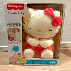 a hello kitty stuffed animal in a box