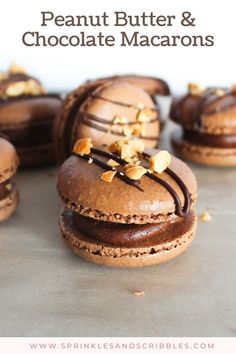 chocolate macaroons with peanut butter and chocolate drizzled on the top