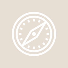 a white clock on a beige background