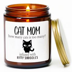 a candle with a label on it that says, cat mom how many cats is too many?