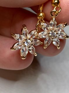 I take a portion of all sales and donate. A portion can be donated to mission fields, another time to Disabled Veterans (My Father served this Country's), Children's Hospitals, ect.. Thank you for helping me to help others.Gold Plated Tiny Cubic Zirconia Flower Earrings Please message me at the checkout, if you would like the item with a gift box (Complimentary) To return to my homepage, click the below: https://www.etsy.com/shop/AllisonsJewels Food Necklace, Funky Necklace, Flower Earrings Gold, Fruit Necklace, Golden Necklace, Earrings Dainty, Unique Jewelry Designs, Women's Jewelry And Accessories, Cool Necklaces