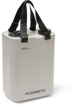 a white and black cooler bag with straps on the front, attached to it's side