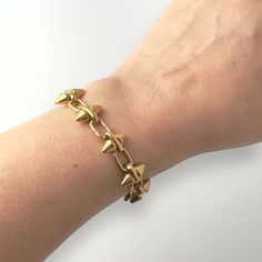 This Barbie Chain Bracelet combines boldness and playfulness in one stunning design. Made from tarnish-resistant stainless steel, it features a striking double spike chain that adds an edgy yet elegant touch to any outfit. Perfect for stacking or wearing solo, this versatile bracelet is a must-have for those who want to make a statement. Available in 18K yellow gold or white gold plating, it’s the ideal accessory for those looking to showcase their fun, fearless, and feminine side in every look. Barbie Chain, Vanessa Simmons, Halo Jewelry, Gold C, Wrist Game, Barbed Wire, Harper’s Bazaar, Southern Charm, Independent Designers Fashion