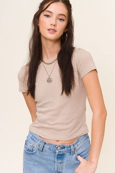 Add to your tee collection with the Laya Cropped Tee. This soft tee is perfect for pairing with relaxed jeans or joggers. Model is wearing a size small 85% Cotton 15% Polyester Trendy Relaxed Fit T-shirt For Layering, Casual Ribbed T-shirt For Spring, Casual Ribbed Short Sleeve Fitted Top, Casual Fitted Crew Neck T-shirt, Relaxed Crew Neck Short Sleeve Top For Everyday, Trendy Short Sleeve Top For Fall, Trendy Short Sleeve Top For Everyday Fall, Trendy Short Sleeve Crew Neck Top For Layering, Trendy Spring T-shirt For Layering