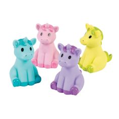 four small plastic animals sitting next to each other