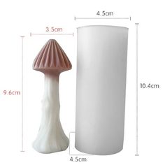 a white vase with a pink mushroom on the top and measurements for it's size